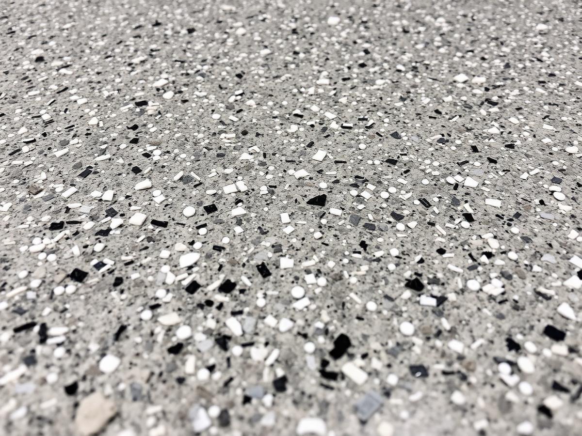 Close-up of decorative flake concrete coating